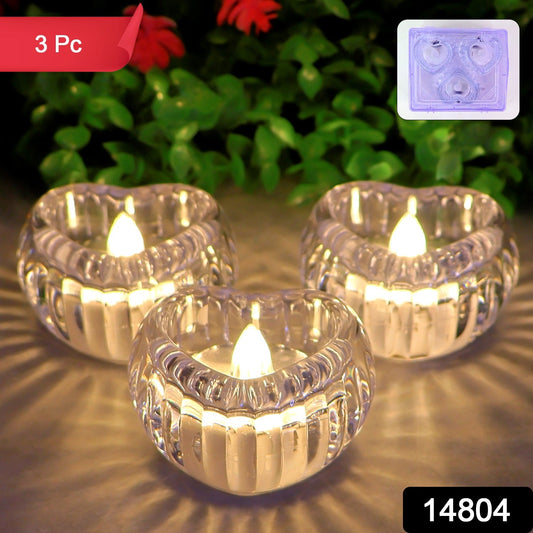Close-up of heart-shaped LED flameless candles glowing softly
