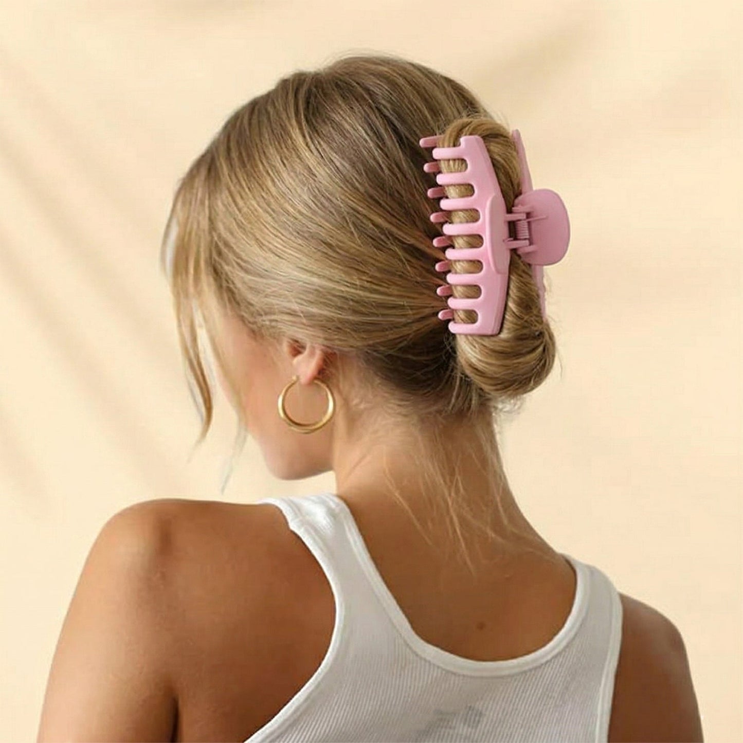 Pink hair claw clip from holding hair nicely