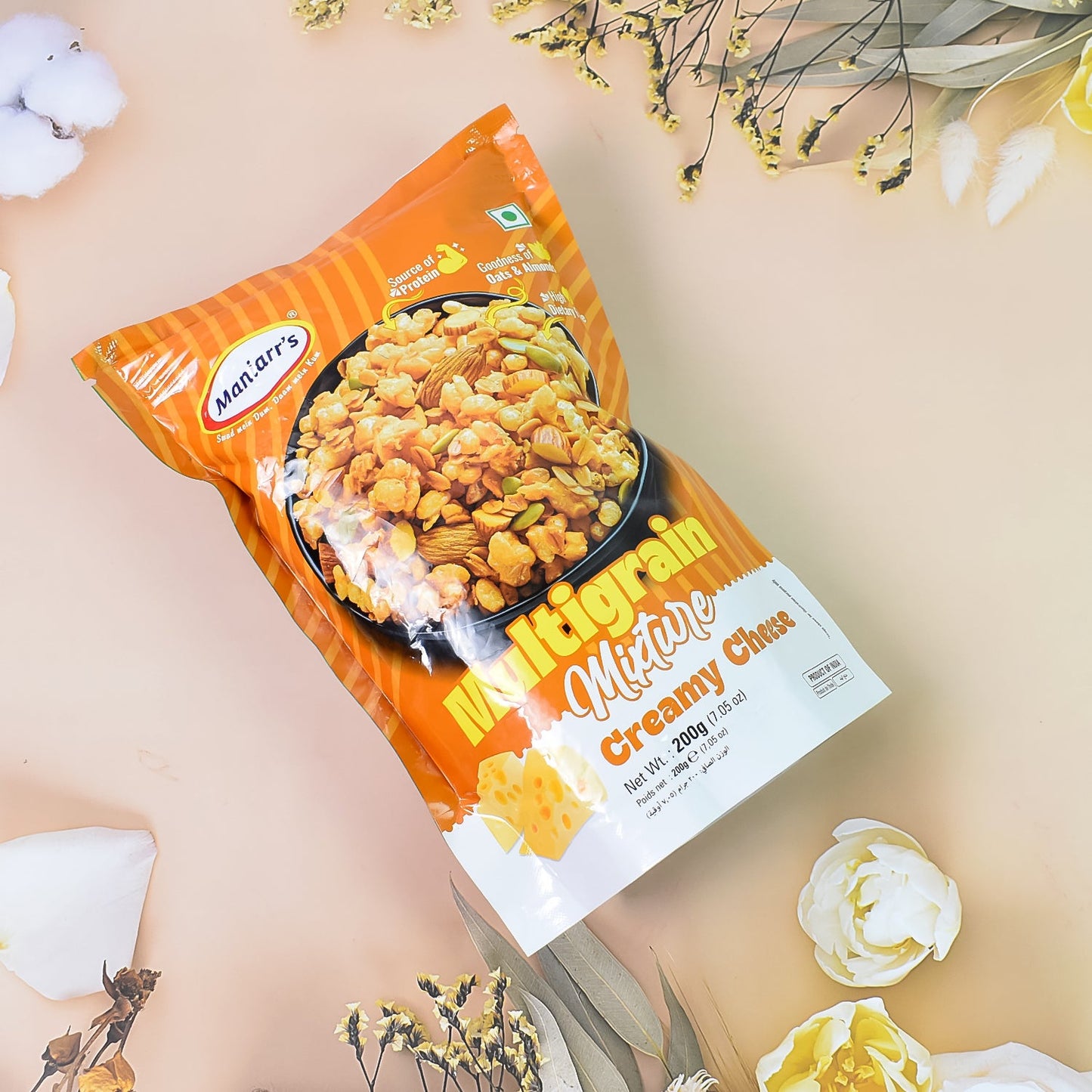 Side view of Maniarr's Roasted Multigrain Mixture packaging with nutritional information.
