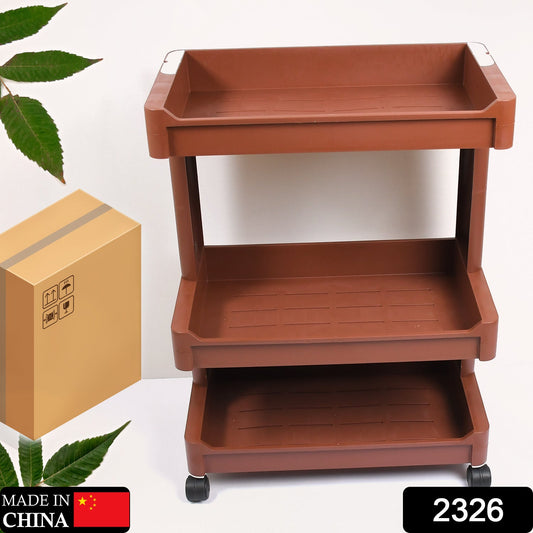 Mobile plastic kitchen bar cart with sturdy wheels for easy movement.