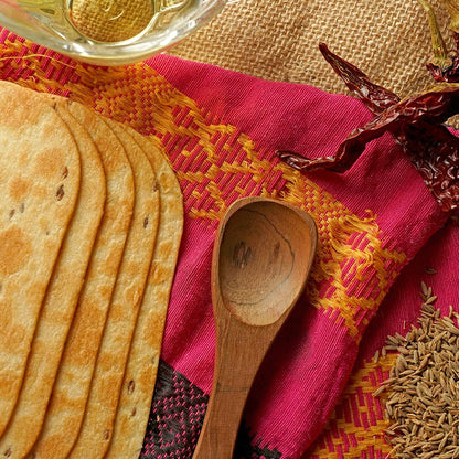 Close-up of golden Jeera Slim Bites, showcasing their texture and cumin seasoning.