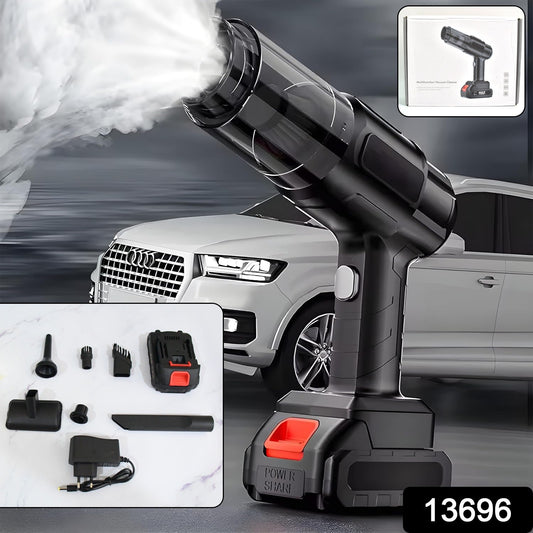 Compact portable vacuum cleaner being used to clean car interior, highlighting its cordless design.